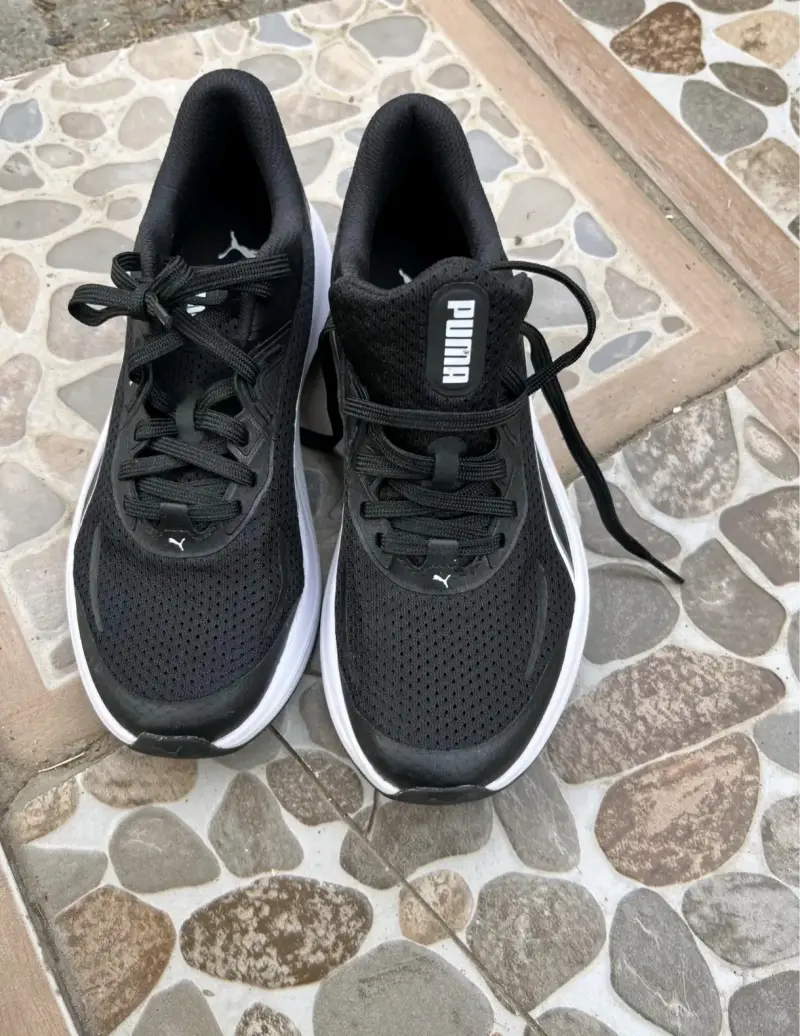 Zapatillas negras Puma deportivas - 1