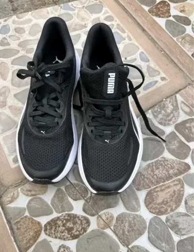 Zapatillas negras Puma deportivas - miniatura 1