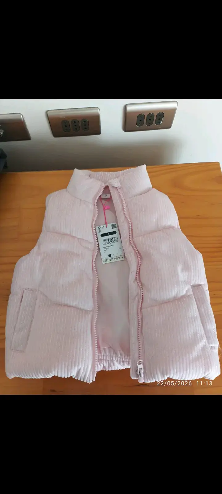 Chaleco acolchado rosado para niña