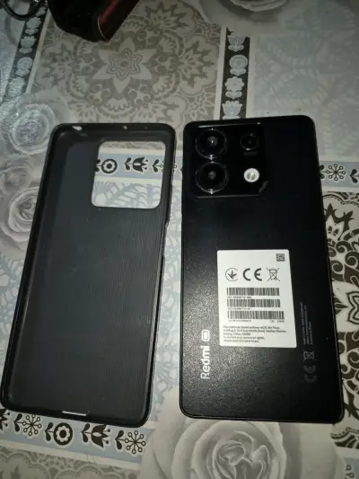Teléfono inteligente con funda - miniatura 2