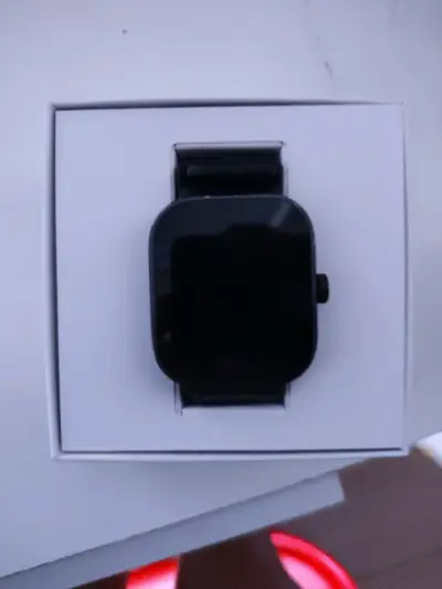 Redmi watch 4 con su cargador y caja - miniatura 1