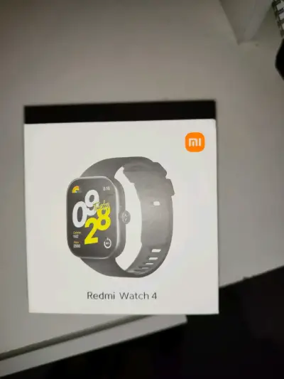 Redmi watch 4 con su cargador y caja - miniatura 2
