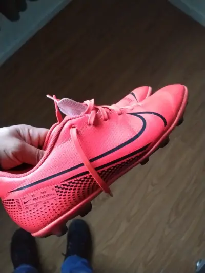 Zapatillas deportivas naranjas Nike - miniatura 1