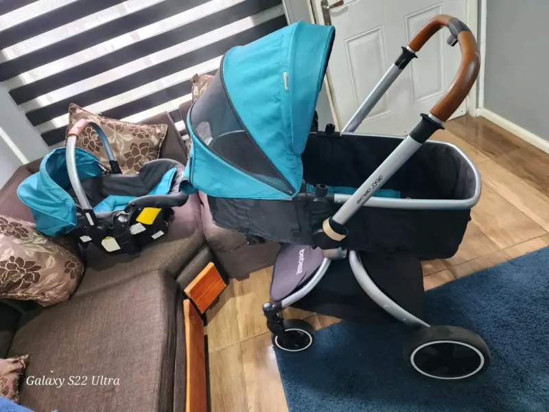 Coche de bebé turquesa y negro - 4