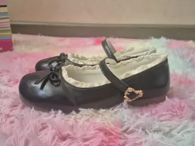 Zapatos negros con lazo - miniatura 1