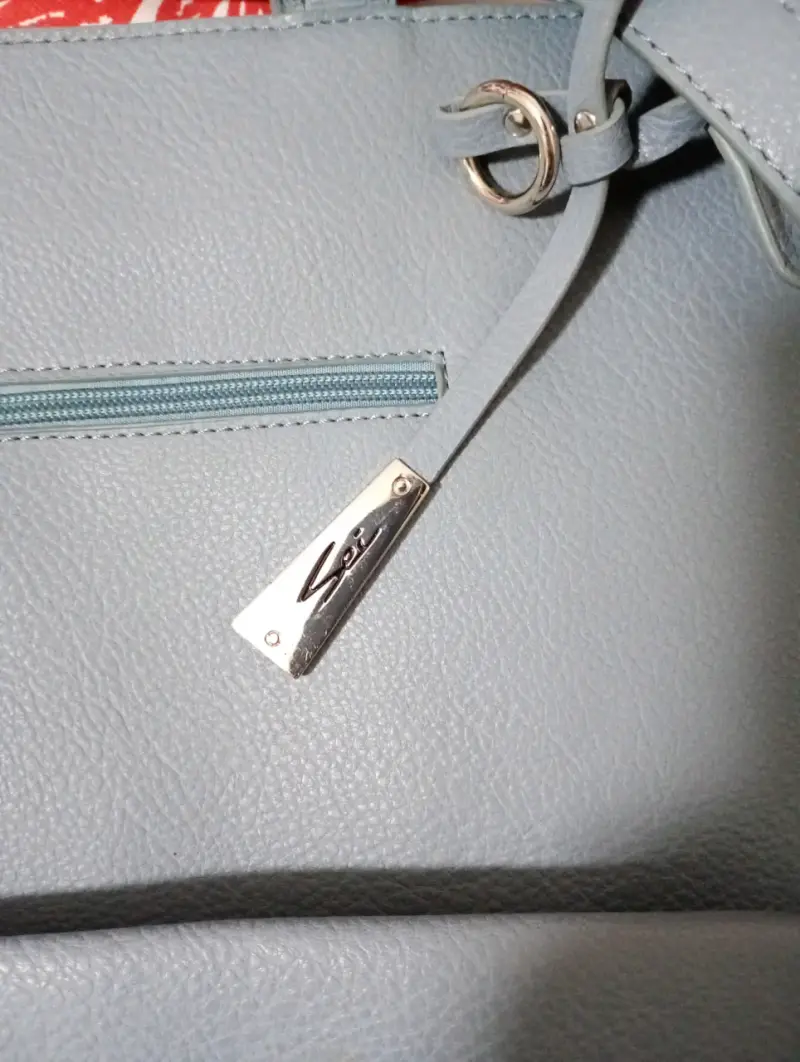 Bolso azul de mano marca Sei - 2