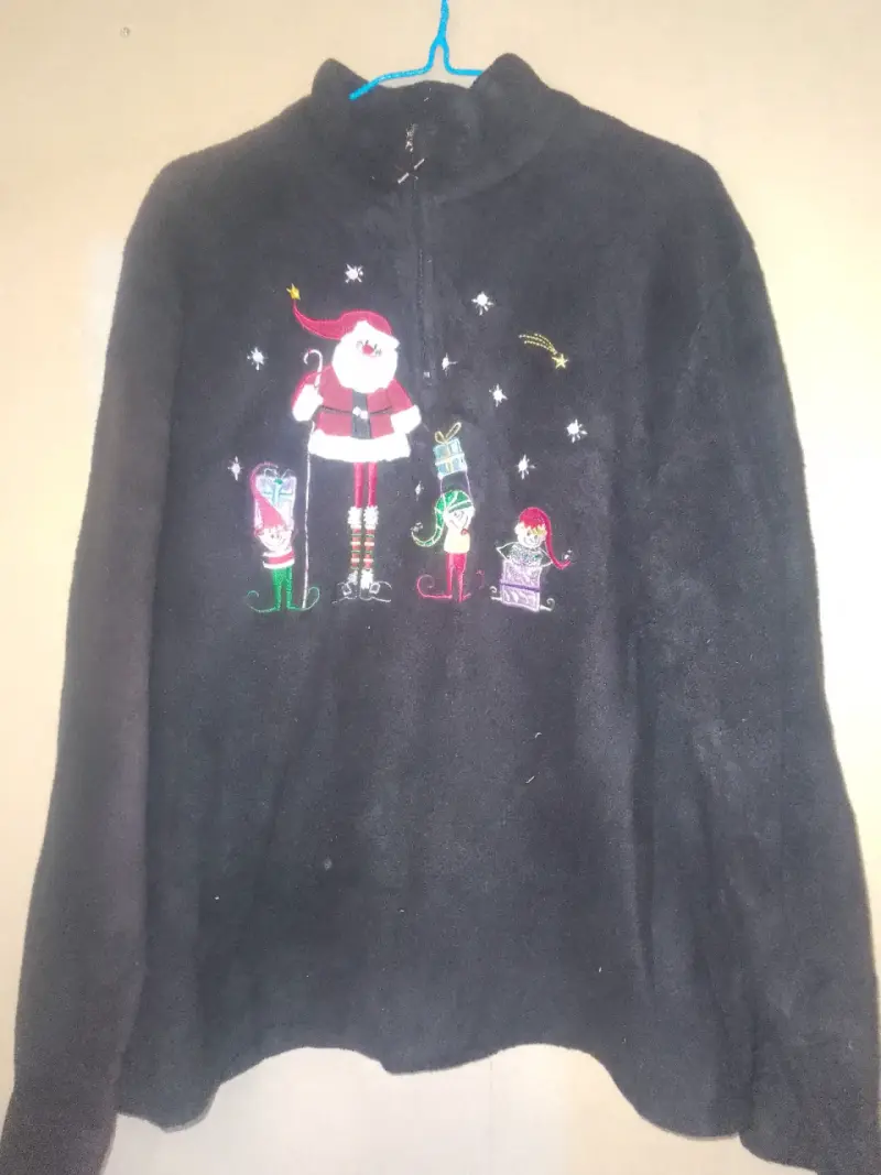 Sweater polar navideño negro