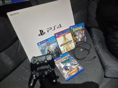 Consola PS4 con juegos y accesorios - miniatura 1