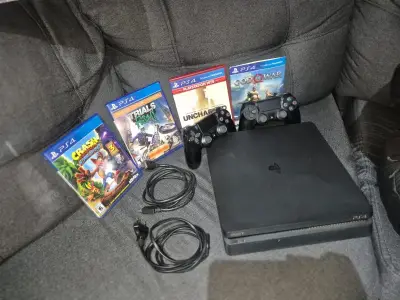 Consola PS4 con juegos y accesorios - miniatura 3