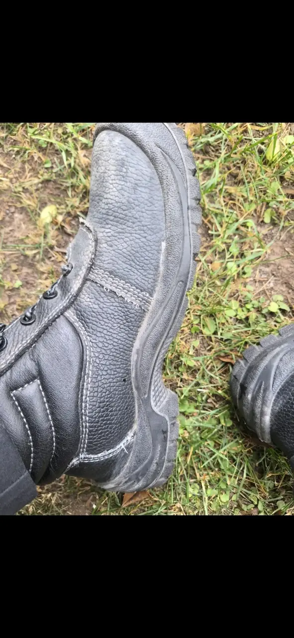 Botas de cuero negro usadas - 1