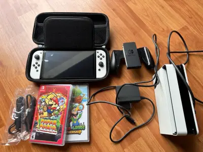 Consola Nintendo Switch oled blanca +2 juegos - miniatura 1