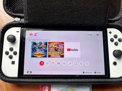 Consola Nintendo Switch oled blanca +2 juegos - miniatura 3