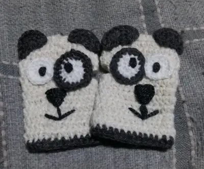 Mitones tejidos de panda - miniatura 1