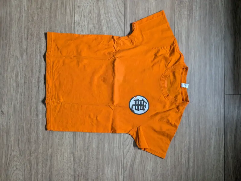 Polera naranja estampado círculo - 1