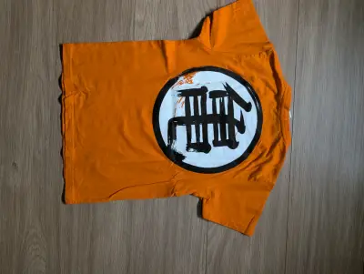 Polera naranja estampado círculo - miniatura 2