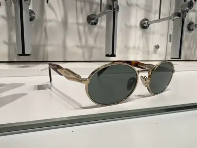 Gafas de sol Prada doradas - miniatura 1