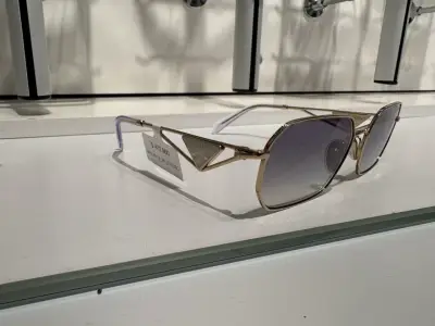 Gafas de sol doradas Prada - miniatura 1