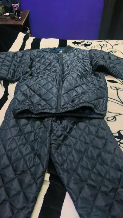 Traje acolchado color azul - miniatura 1