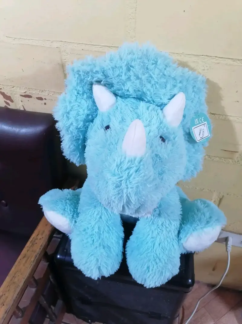 Peluche dinosaurio celeste
