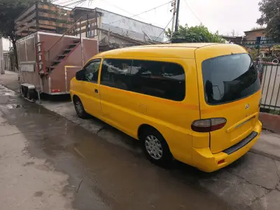 Furgón amarillo con remolque - miniatura 1