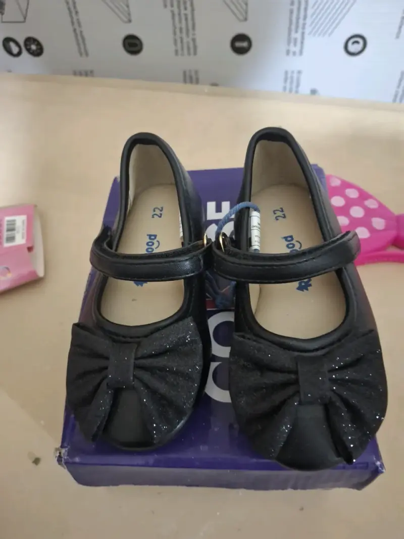 Zapatos de niña negros con lazo