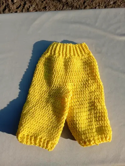 Pantalones tejidos amarillos - miniatura 2