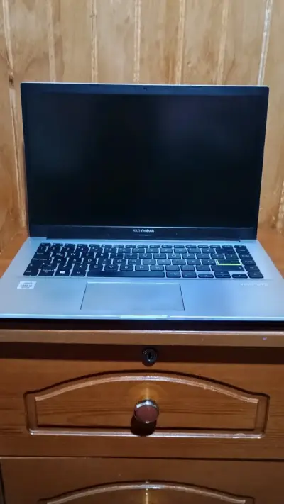 Laptop ASUS VivoBook gris - miniatura 1