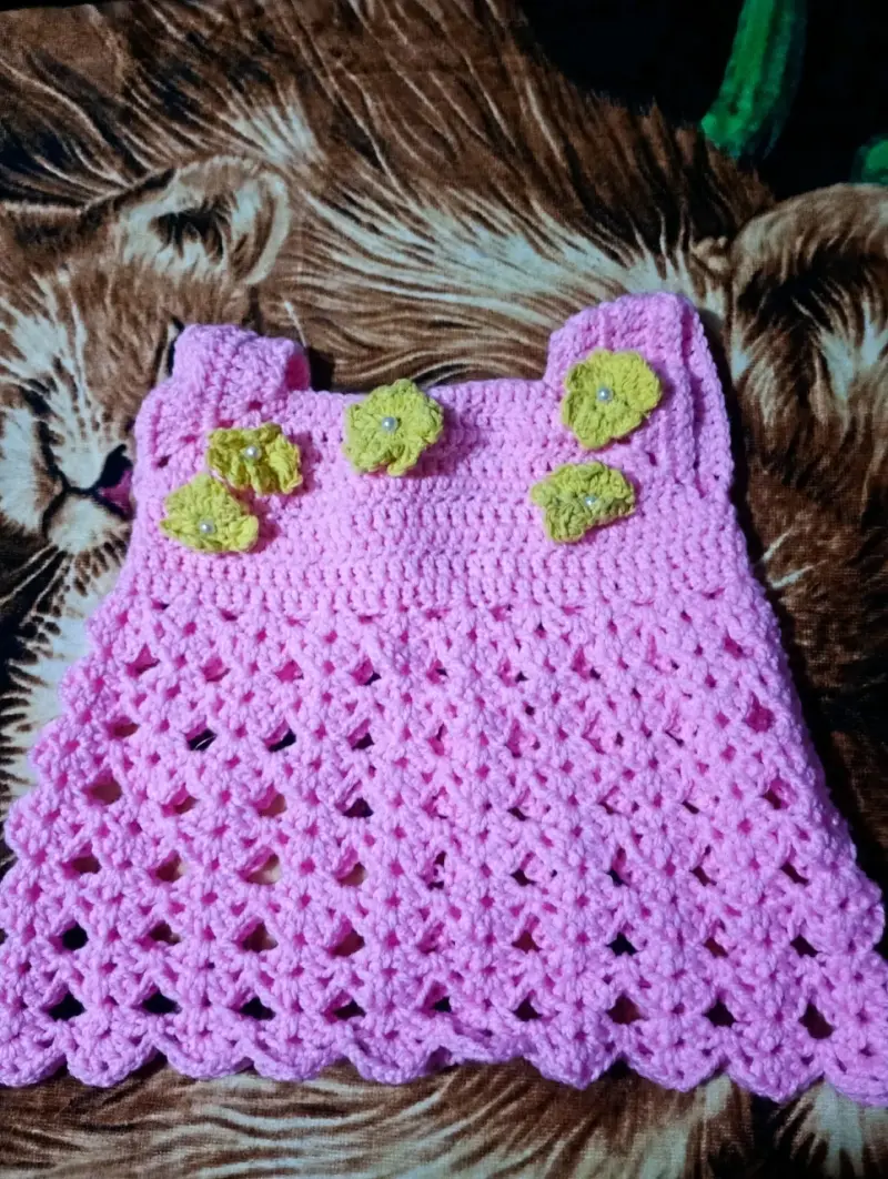 Vestido tejido rosa para bebé