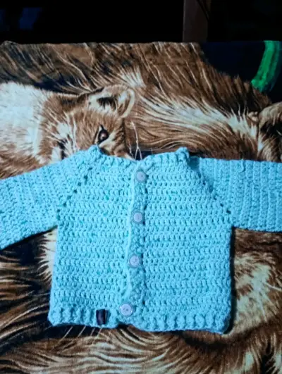 Chaleco tejido celeste bebé - miniatura 2