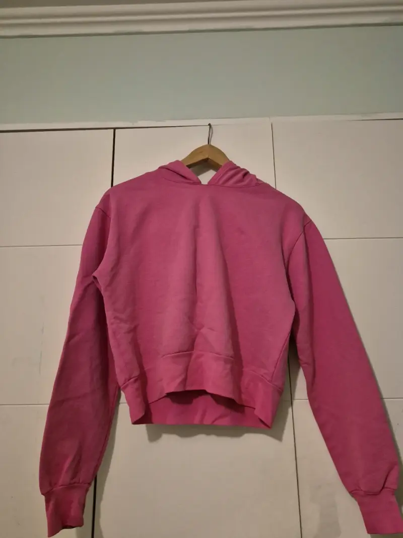 Polerón rosado con capucha
