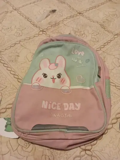 Mochila infantil rosa y verde - miniatura 1