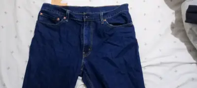 Jeans azul oscuro ajustados - miniatura 1