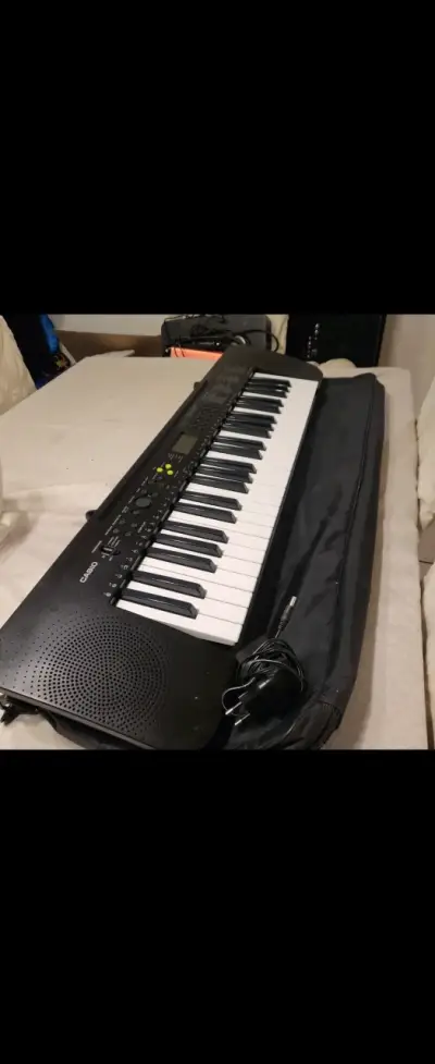 Teclado electrónico Casio con funda - miniatura 3