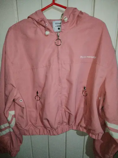 Chaqueta rosa con capucha - miniatura 1