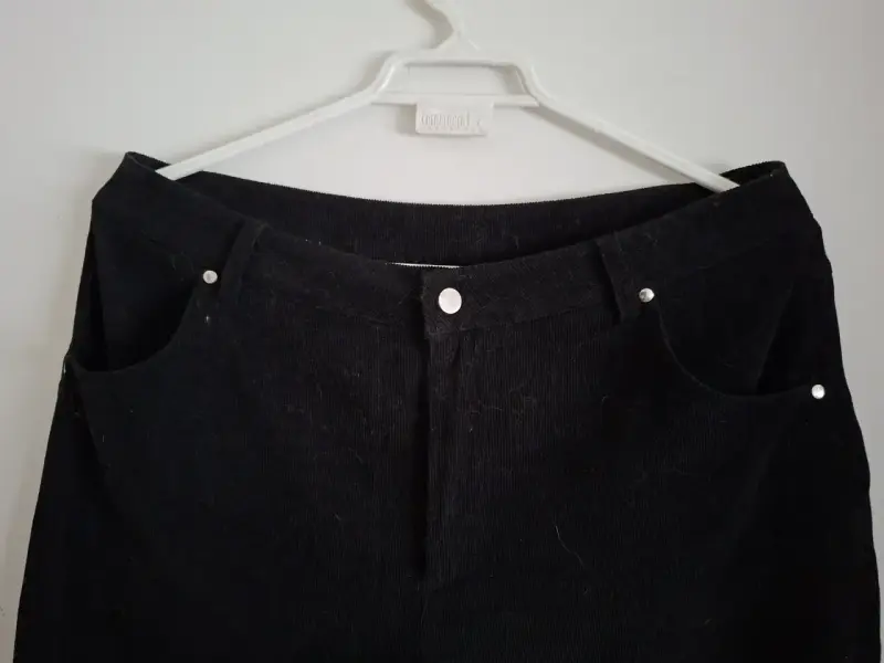 Pantalones negros acampanados - 2