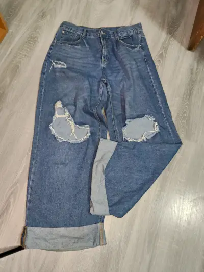 Jeans azules rasgados - miniatura 1