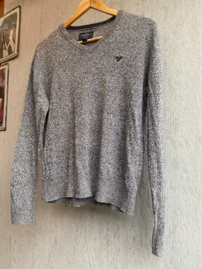 Suéter gris cuello V - miniatura 4