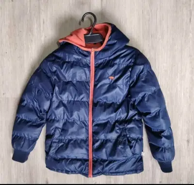 Chaqueta acolchada azul con capucha - miniatura 1