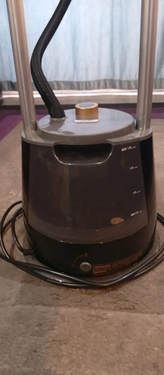 Vaporizador de ropa Oster - 6