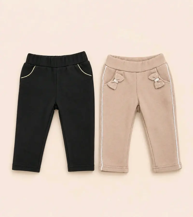 Pantalones infantiles beige y negro - 1