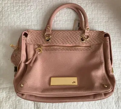 Cartera rosada de cuero - miniatura 1
