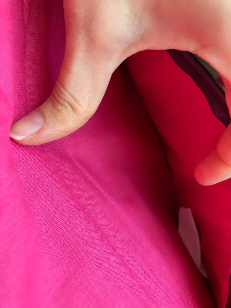 Cartera de mano tejida fucsia - 2