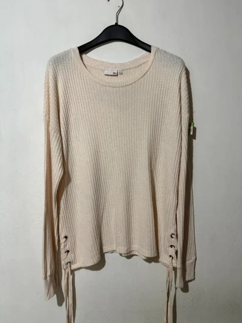 Sweater beige con cordones