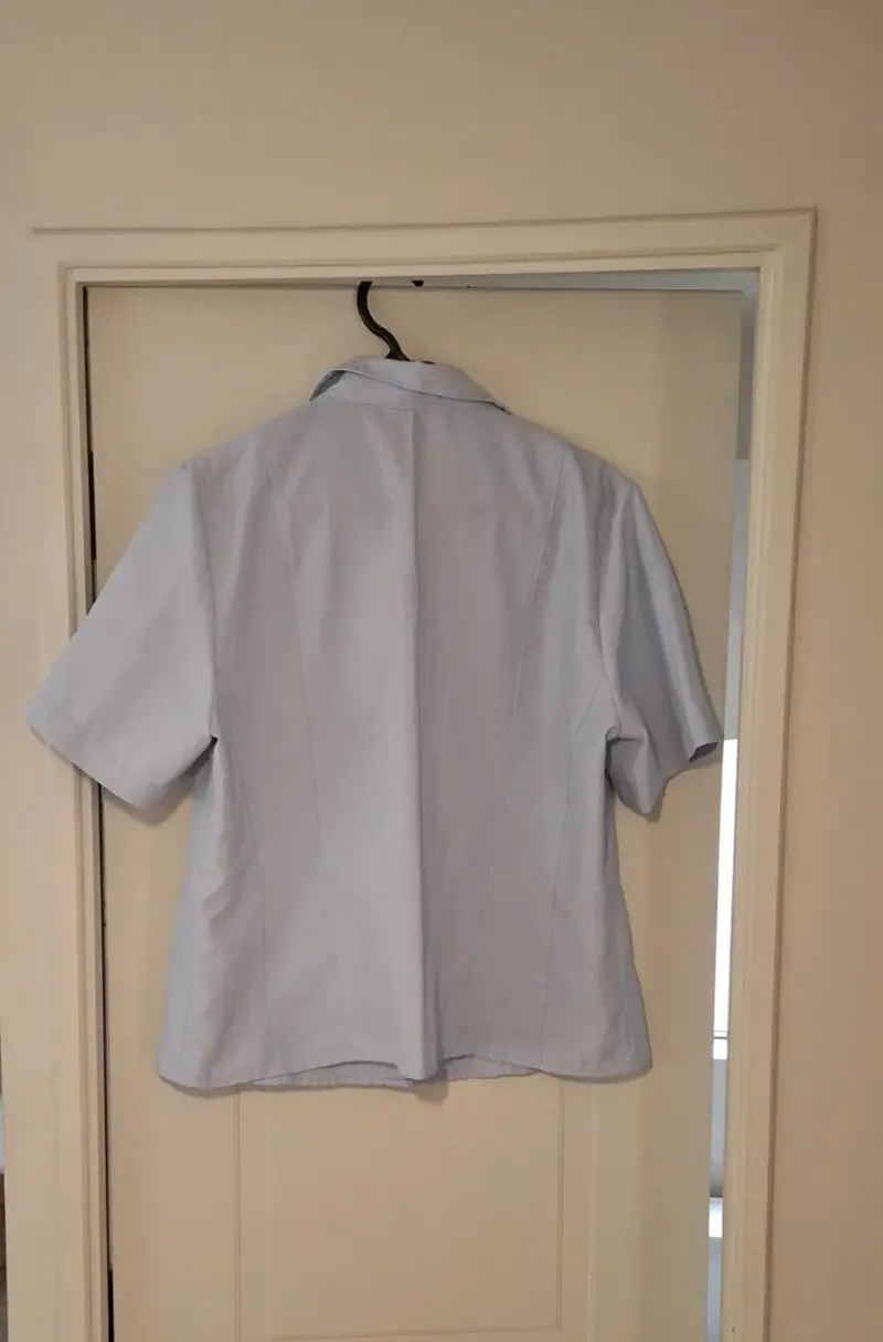 Blusa celeste de manga corta - 2