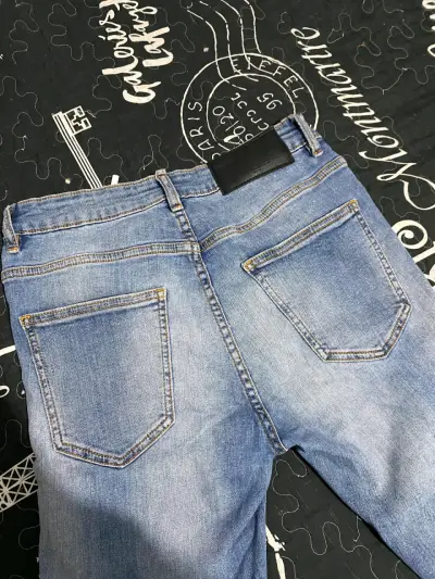 Jeans azul de mezclilla de marca - miniatura 1