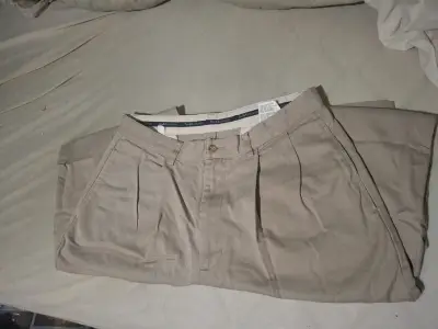Pantalones beige con pliegues - miniatura 1