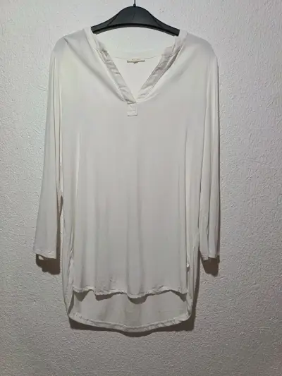 Blusa blanca de tela ligera - miniatura 1