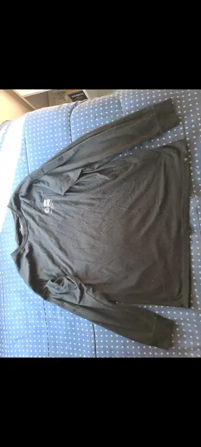 Polera negra manga larga Rip Curl - miniatura 1