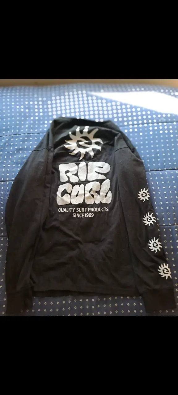 Polera negra manga larga Rip Curl - 2