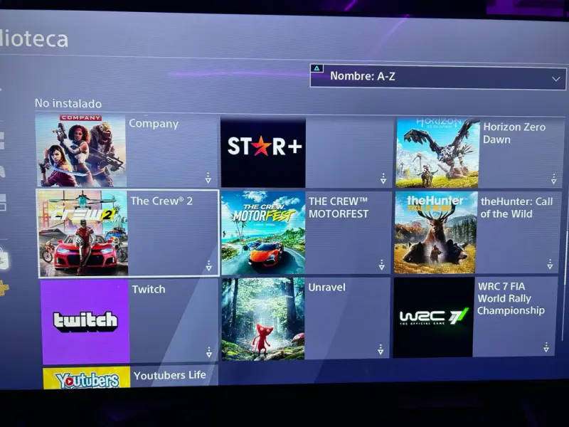 Consola PS4 con volante y juegos - 3